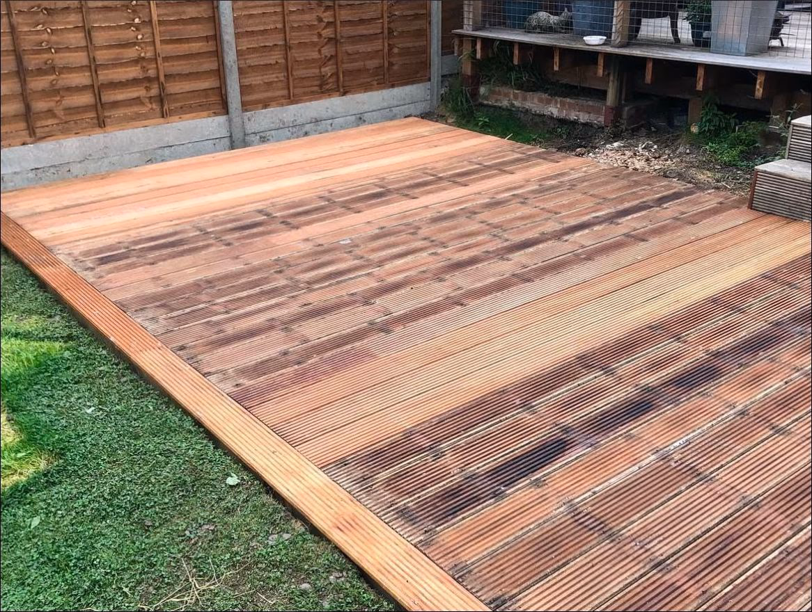 A patio and decking project in a Teddington garden